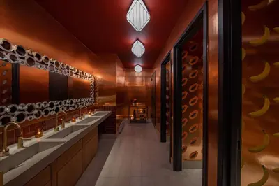 a tasting room with sinks and wine glasses at Moxy Brooklyn Williamsburg in Brooklyn