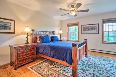 a bedroom with a bed and a ceiling fan at Wilmington Home on 18 Acres about 9 Mi to Skiing! in Wilmington