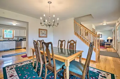 a dining room with a table and chairs at Wilmington Home on 18 Acres about 9 Mi to Skiing! in Wilmington