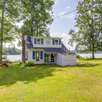Lakefront Cottage with Covered Porch and Dock!