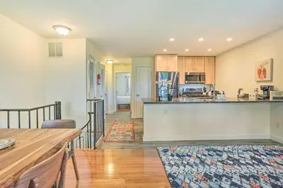 a kitchen and living room with a counter top at Sun-Lit Vernon Condo Less Than 2 Mi to Ski Resort! in Vernon Township