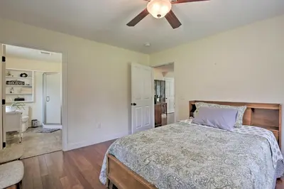a bedroom with a bed and a ceiling fan at Ashley Falls Home with Fire Pit Hike and Ski! in Ashley Falls