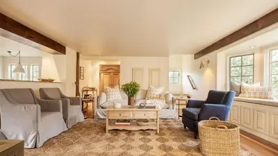 a living room with couches and chairs and a table at 4BDR Heritage Estate w Pool Private Pond Fire Pit Cortland by AvantStay in Saugerties