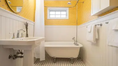 a bathroom with a sink and a bath tub and a sink at 4BDR Heritage Estate w Pool Private Pond Fire Pit Cortland by AvantStay in Saugerties