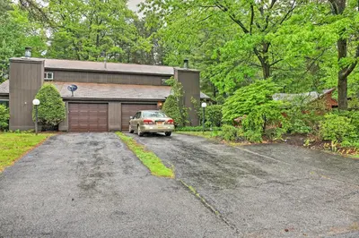 a car parked in the driveway of a house at Malta House with Pool 9 Mi to Saratoga Race Course! in Ballston Spa