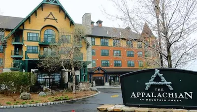 a sign in front of an apartment building at Mountain Creek Resort at Appalachian Hotel - Pool & Hot Tub in Vernon Township