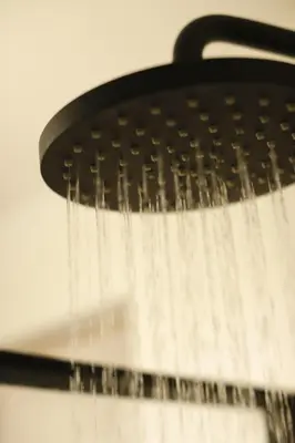 a shower with water pouring out of it at The Vine on Main in Stamford