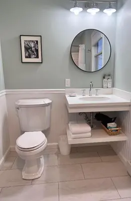 a bathroom with a toilet and a sink at Blue Vista Motor Lodge in Florida