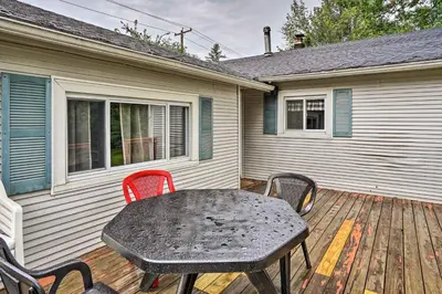 a table and chairs sitting on a wooden deck at Secluded Getaway Less Than 10 Mi to Saratoga Springs! in South Corinth