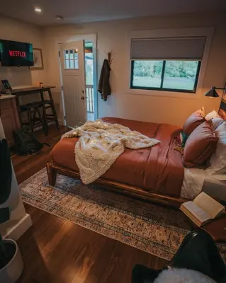 a bedroom with a large bed in a room at The Willow, Catskill in Catskill