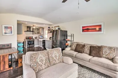 a living room with two couches and a kitchen at Jewett Gem with Charcoal Grill and Mountain Views in Jewett