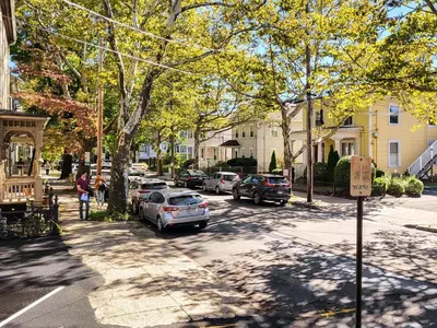 a street with cars parked on the side of the road at Beautiful Wooster Sq. getaway - great neighborhood in New Haven