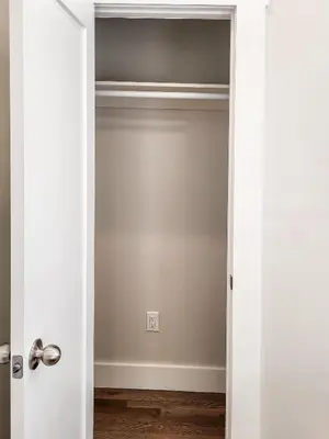 a room with a closet with a door open at Beautiful Wooster Sq. getaway - great neighborhood in New Haven