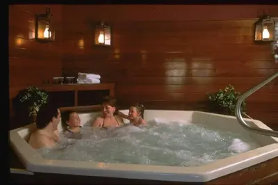 a group of people in a bath tub at Unique Yeti-Theme Ski On Off Suite Jiminy-Sleeps 4 in Hancock