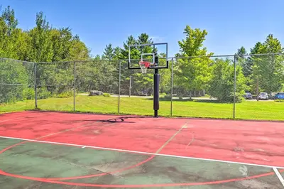 a basketball hoop on a tennis court at Comfortable Dover Apartment Walk to Mt Snow! in Dover