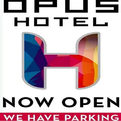a poster with the words freeze ther now open we have parking at Hotel OPUS Bronx Near Bay Plaza Mall in Bronx