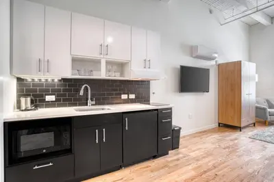 a kitchen with a sink and a microwave at Trumbull Apartments Hartford CT in Hartford