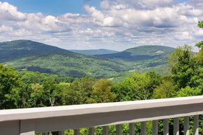 a view of the mountains from a balcony at Bovina Mountain High in Bovina Center