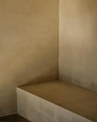a corner of a room with a mattress in it at Inness in Accord