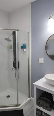 a bathroom with a shower and a sink at Heavenly Home in New Haven in New Haven