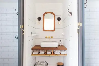 a bathroom with a sink and a mirror at Howland House in Mount Tremper
