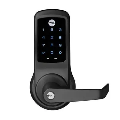 a cell phone hooked up to a door handle at 69-3A Prime LES Modern Brand New 1BR in New York