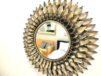 a large fish mirror on a wall in a living room at 1597-6 Luxury Studio Upper East Side W&D in New York