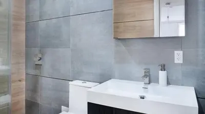 a bathroom with a white sink and a toilet at 1597-6 Luxury Studio Upper East Side W&D in New York