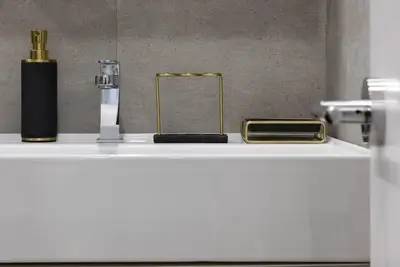a white counter with two items on top of it at 78-2D New furnished 1BR WD walk to Central Park in New York