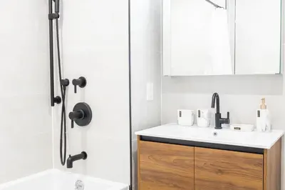 a bathroom with a sink and a shower at 149BK-202 NEW Condo 1BR IN PRIME GREENPOINT BK in Brooklyn