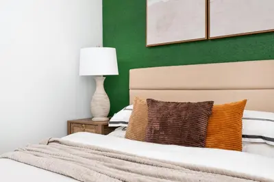 a bedroom with a bed and a lamp on a table at 139-3E west village 1BR best value in New York