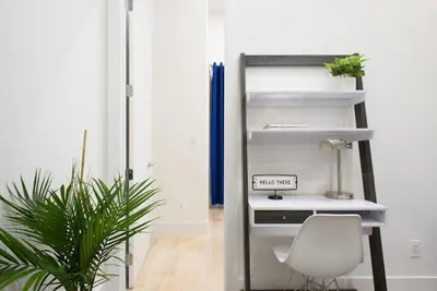 an office with a white desk and a white chair at 78-4D Quality 1br W&D SKYLIGHT By Central Park in New York