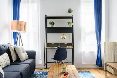 a living room with a couch and a table at 428-3R Spacious Prime Midtown 2BR Newly furnished in New York