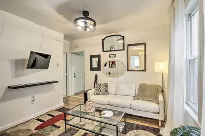 a living room with a couch and a table at Hartford Vacation Rental - Close to Downtown! in Hartford