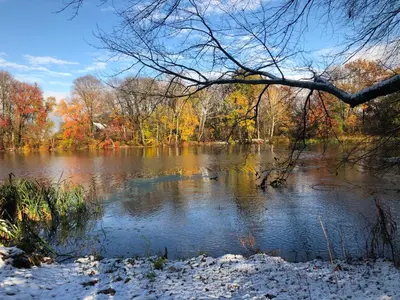 a view of a river with snow on the water at Farmhouse Broad Brook: Comfort & Charm. in East Windsor
