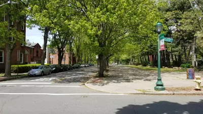 a street with a street light on the side of a road at Lovely 2BR apartment by Wooster Square- great neighborhood in New Haven