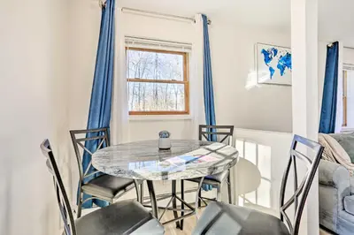 a dining room with a table and chairs at New Paltz Apt - 11 Mi to Poughkeepsie! in New Paltz