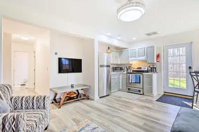 a living room with a couch and a table at New Paltz Apt - 11 Mi to Poughkeepsie! in New Paltz