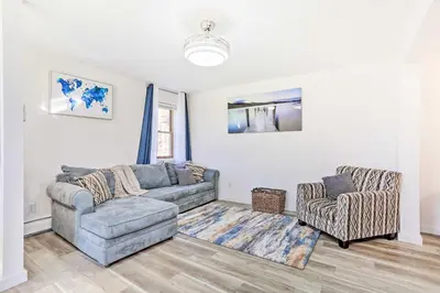 a living room with a couch and a chair at New Paltz Apt - 11 Mi to Poughkeepsie! in New Paltz