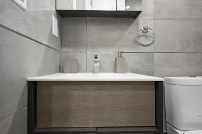 a bathroom with a sink and a toilet at 75-1C New 1BR prime UES W D the unit Best Value in New York