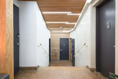 a hallway with a door in a building at 75-1A NEW Prime UES W D in unit Elevator in New York