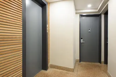 a hallway with a door in a building at 75-3B 3BR Luxury duplex BRAND NEW &D Elevator in New York