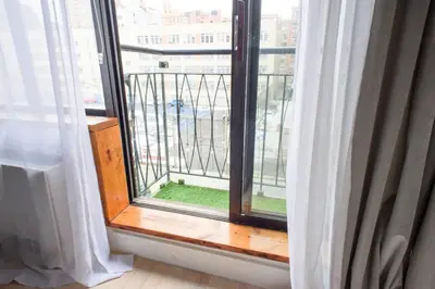 a window with a view of a city at 75-4C New Duplex 3BR W D Elevator Walk to C park in New York