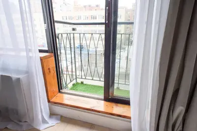 a window with a view of a city at 75-1D New 1BR prime UES W D the unit Best Value in New York