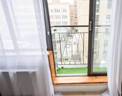 a window with a view of a city at 75-1D New 1BR prime UES W D the unit Best Value in New York