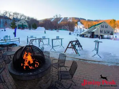 a fire pit with a playground in the snow at WOW-New Ski OnOff Suite By Pool Sleeps 4 Jiminy Pk in Hancock