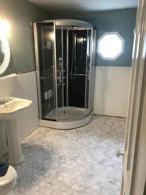 a bathroom with a shower and a sink at Doyle House - Near Cooperstown Dreams Park 2 in Milford