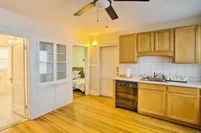 a kitchen with a sink and a stove at Charming Albany Retreat about 3 Mi to Downtown! in Albany