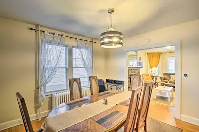 a dining room with a table and chairs at Charming Albany Retreat about 3 Mi to Downtown! in Albany