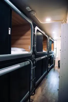 an empty bus with a room with a bed at KAMA CENTRAL PARK in New York